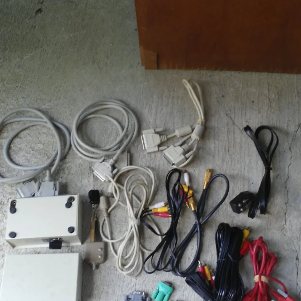 BOX OF COMPUTER CABLES AND MORE.